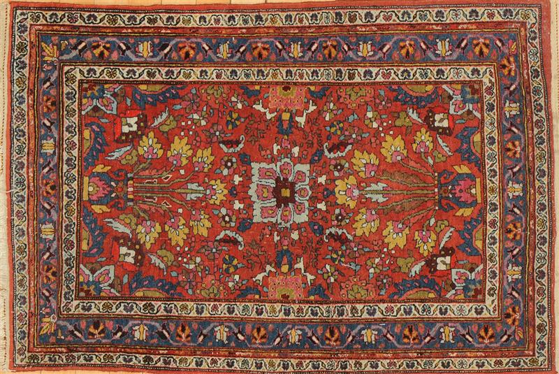PERSIAN TERRACOTTA-GROUND RUG Worked