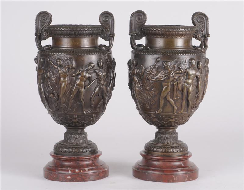 PAIR OF BRONZE TWO-HANDLED URNS