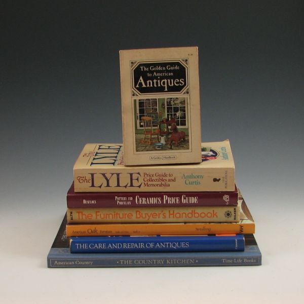 Seven guidebooks on antiques.