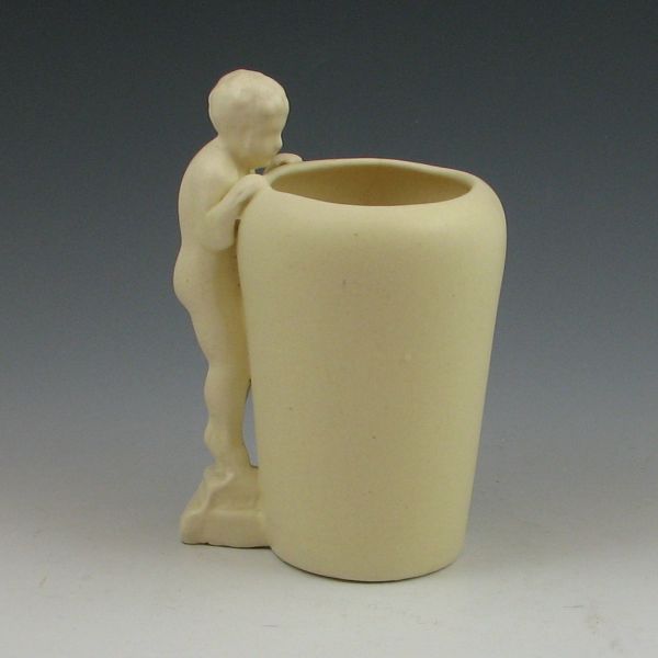 Ivory matte vase with a child looking