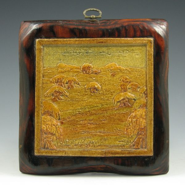 Scenic tile or trivet of a hay