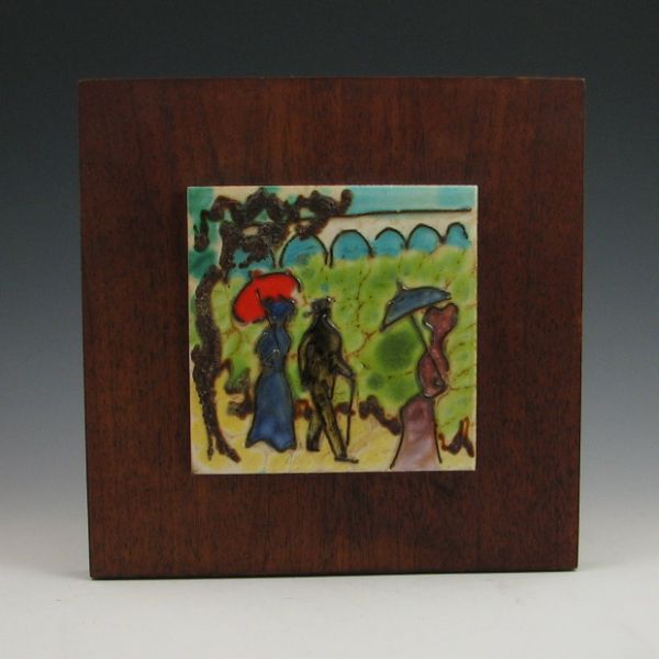 Scenic tile with figures mounted to