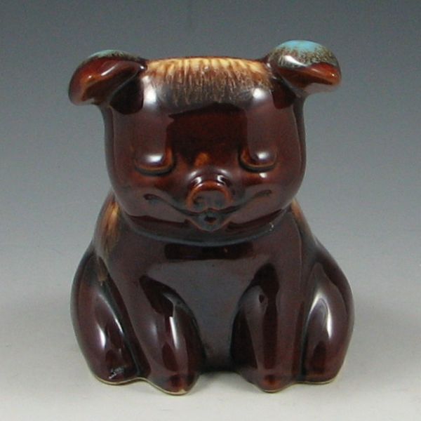 Hull Corky sitting pig bank with