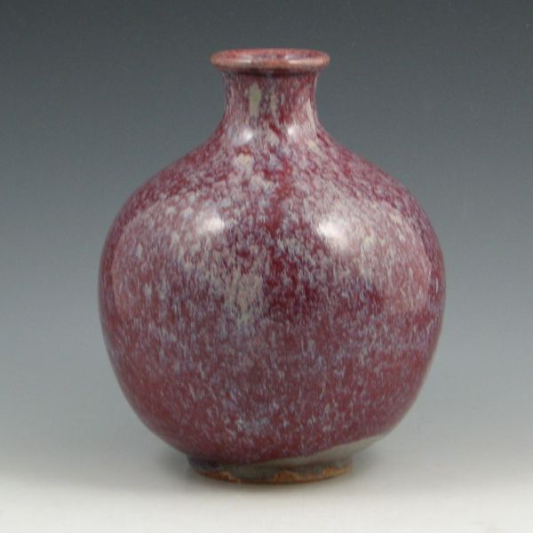 Pottery vase with superior plum drip