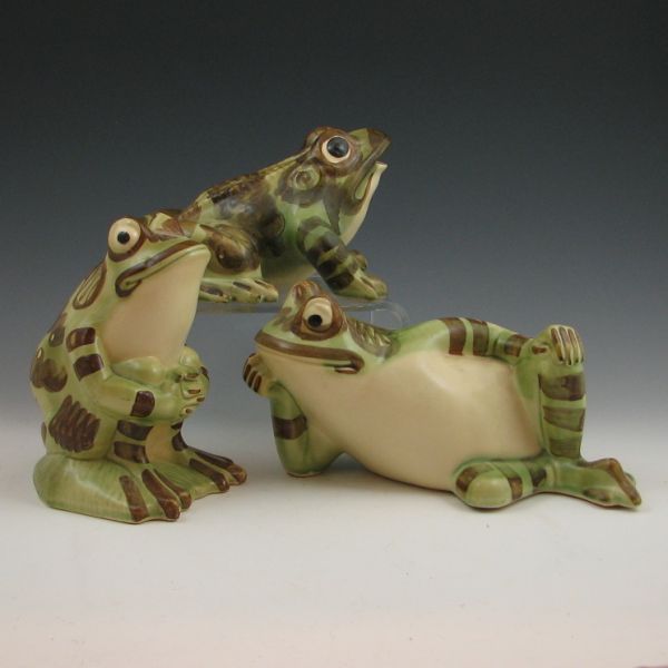 Three Brush frogs including sitting