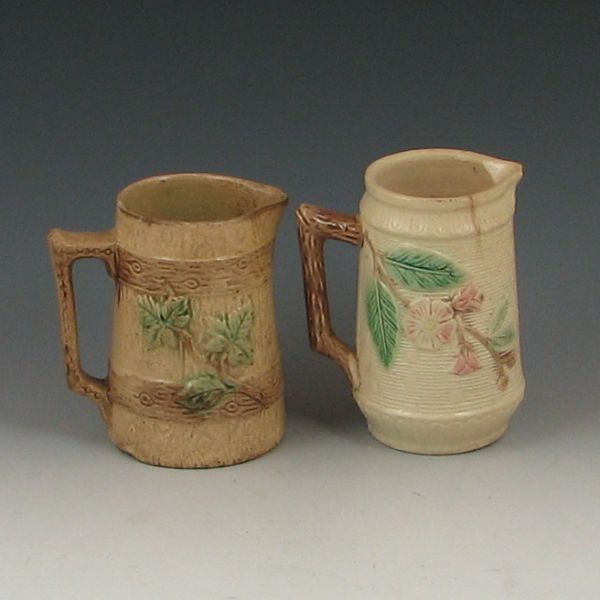 Two 2 Majolica Pitchers left 144a20