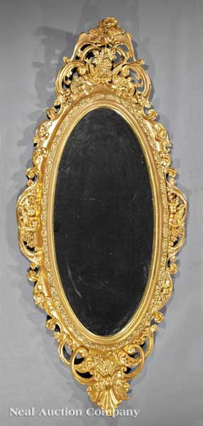 An American Rococo Carved Giltwood