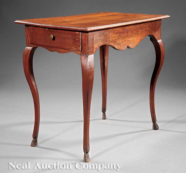 A Louis XV Carved Fruitwood Side