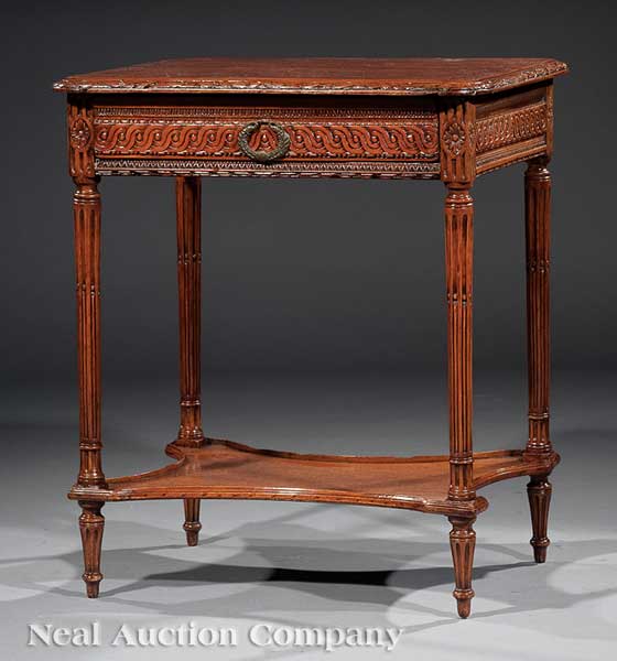 A French Provincial Carved Fruitwood