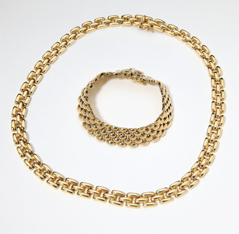 A 14K yellow gold 3-row panther