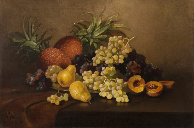 Still life of pineapples peaches grapes