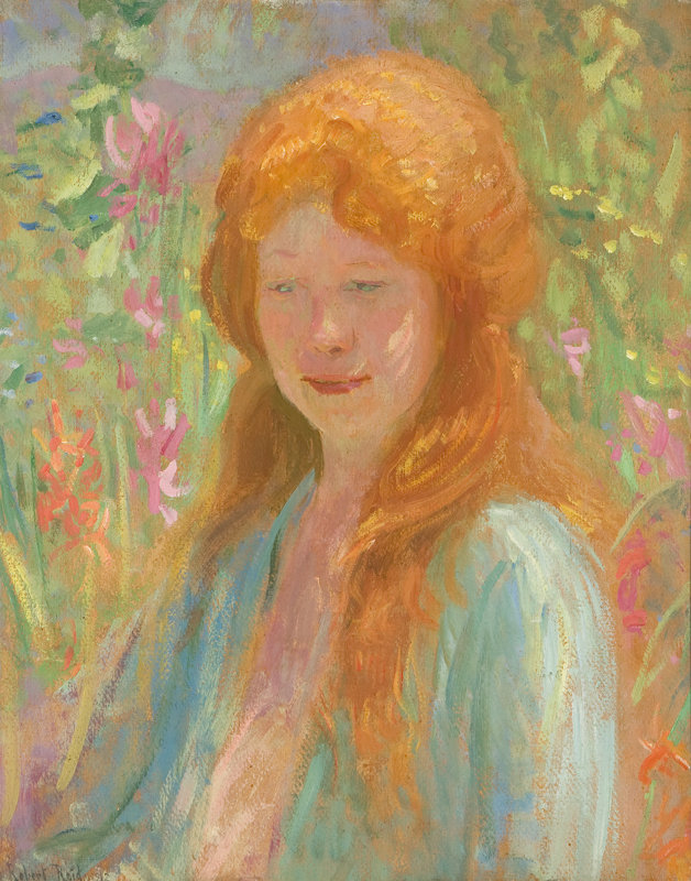 Portrait of a young girl in a garden