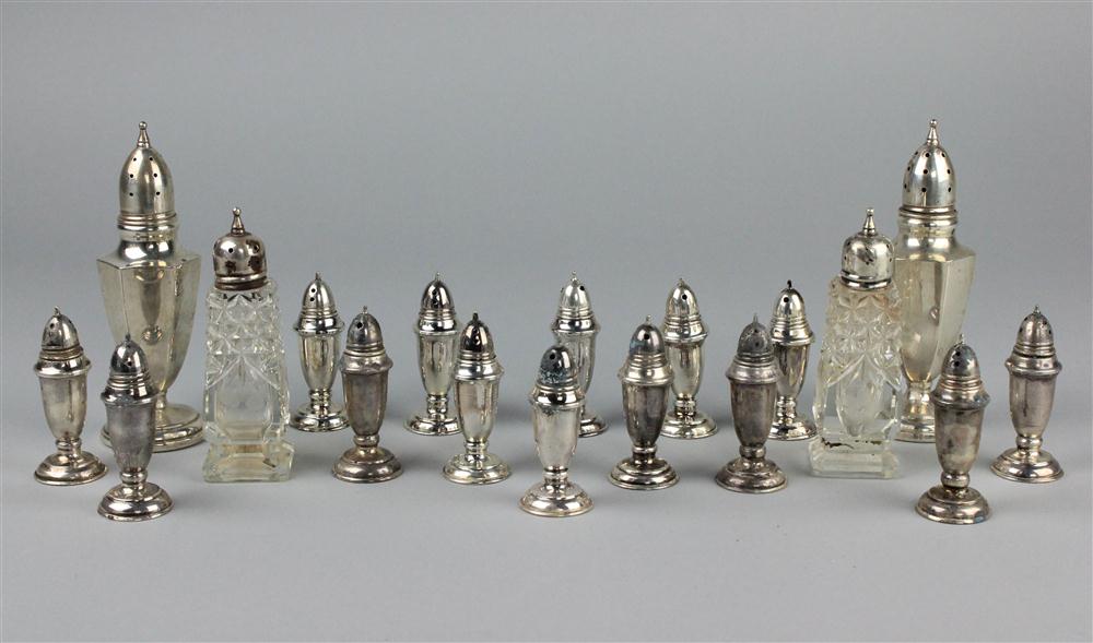 SIXTEEN SILVER CASTERS including