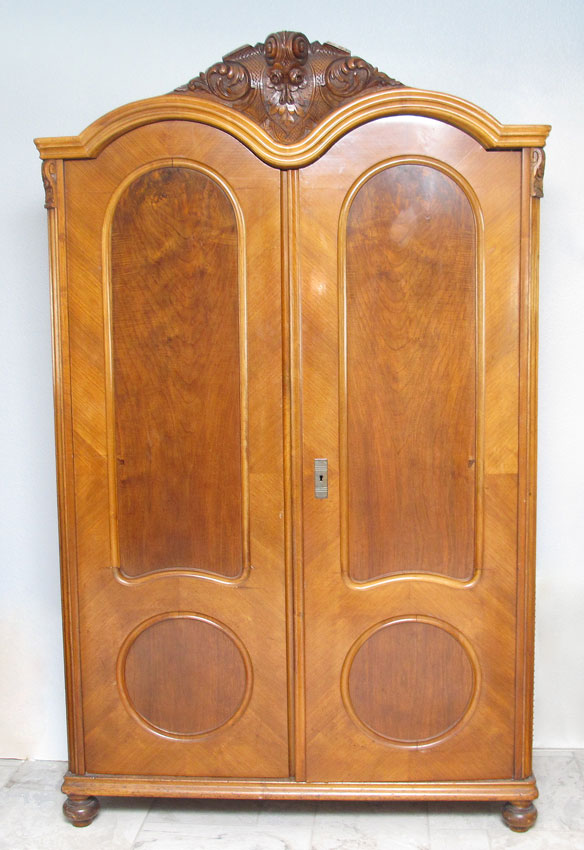 CARVED FRENCH ARMOIRE: Carved crest