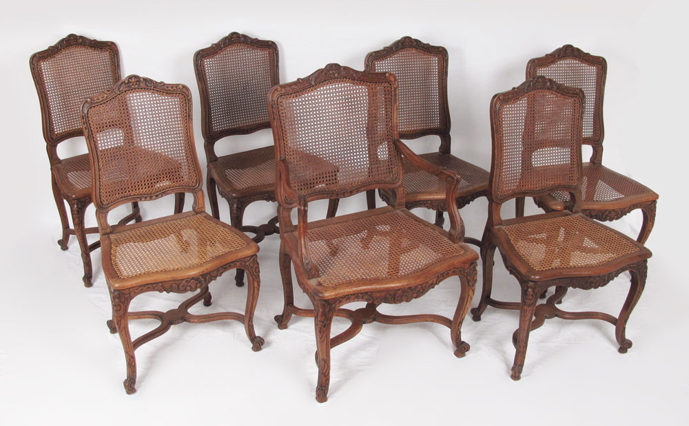 SET OF 7 CARVED CANED DINING CHAIRS: