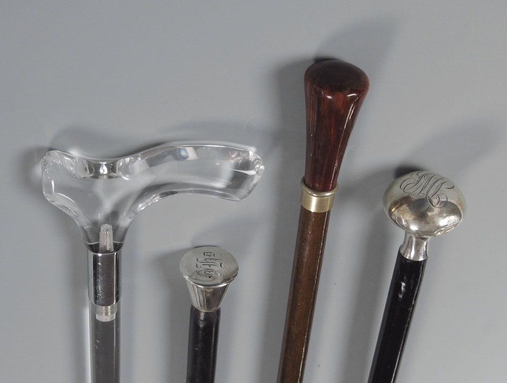 COLLECTION OF 4 WALKING STICKS  145f14