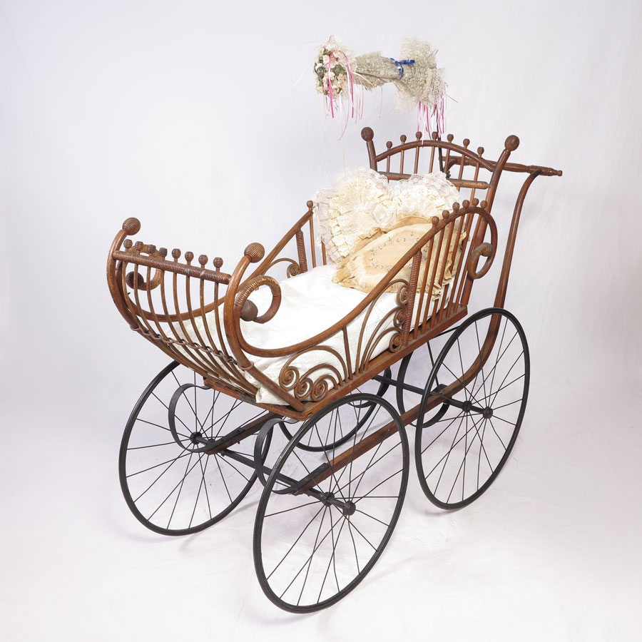 THE HEYWOOD WICKER BABY CARRIAGE: Brass