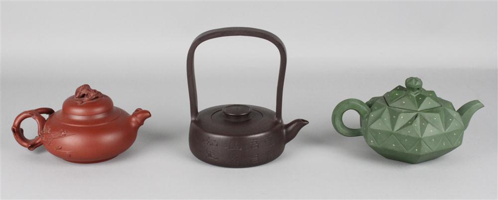 THREE CHINESE SIGNED YIXING TEAPOTS 14621e