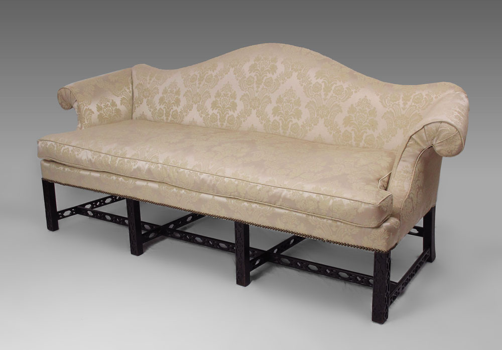 CARVED CHIPPENDALE CAMEL BACK SOFA: