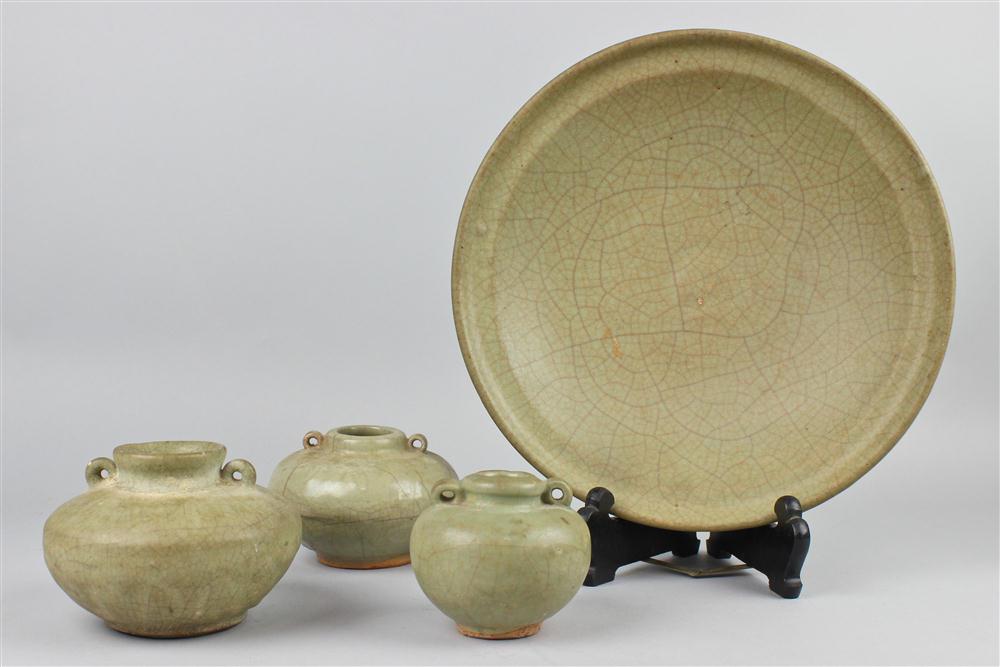 A CHINESE CELADON DISH WITH THREE 146c37