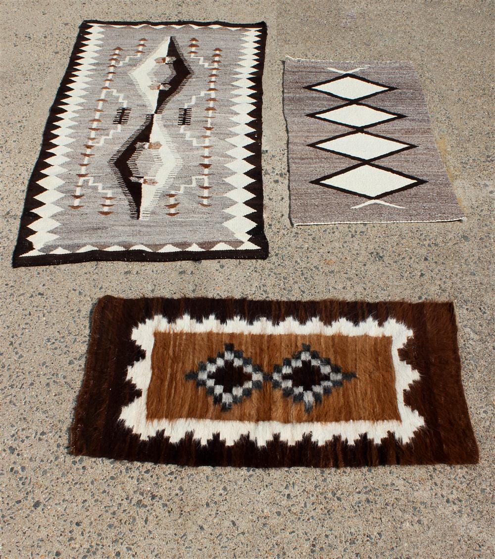 TWO NAVAJO WOOL RUGS TOGETHER WITH 146eba