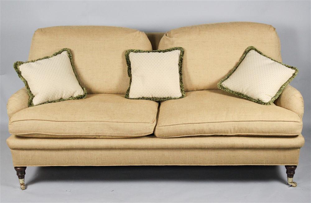 TAUPE UPHOLSTERED CLUB SOFA having