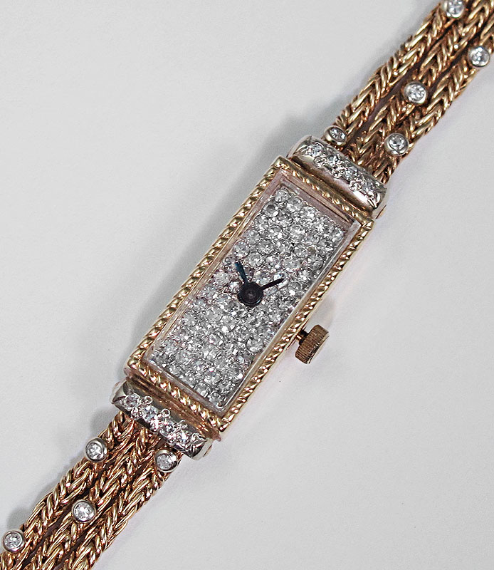 FANCY DIAMOND WRIST WATCH: 14K yellow