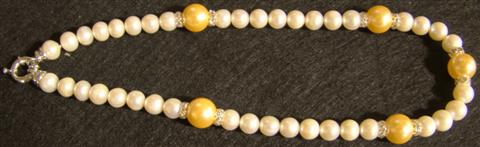 LADY'S CULTURED PEARL AND SWAROVSKI