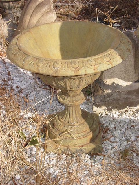 TWO CAST STONE PEDESTAL URNS The