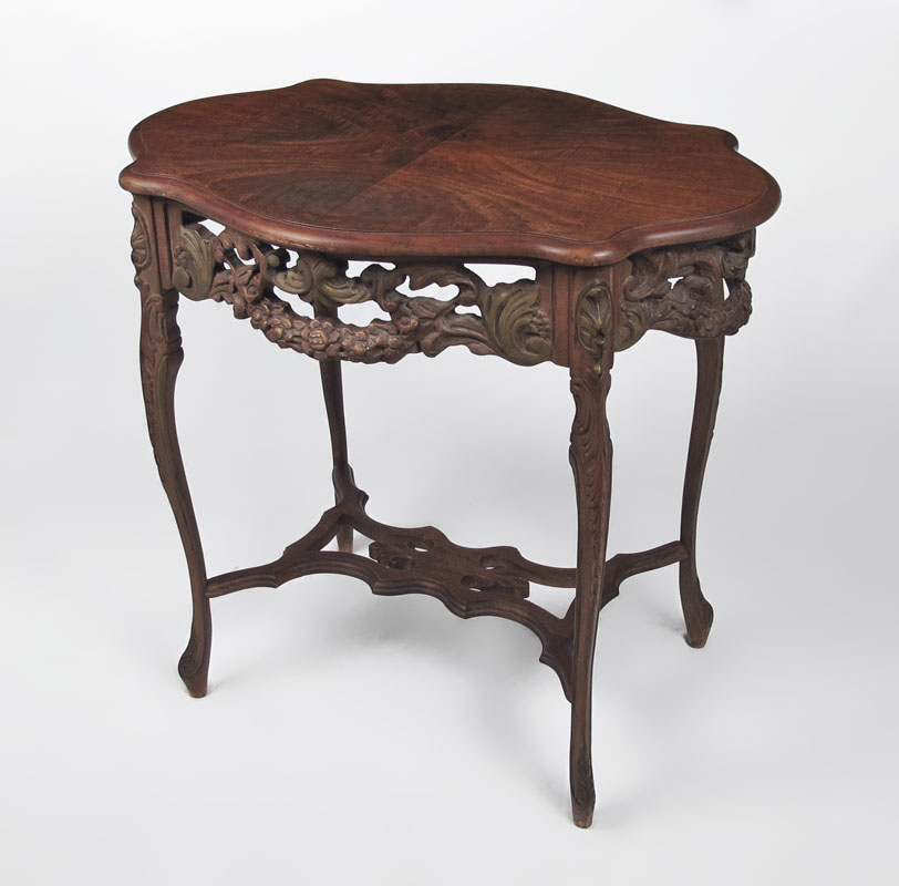 CARVED HALL TABLE: Shaped top with