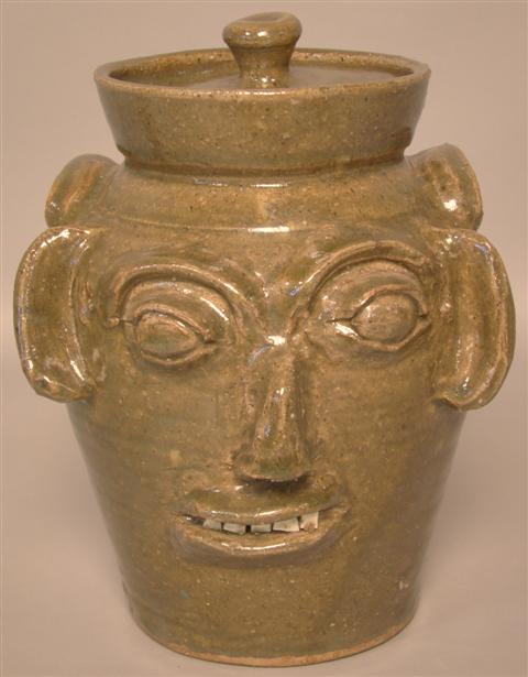 AMERICAN POTTERY FACE COOKIE JAR