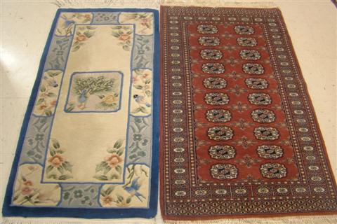 TWO RUGS: CHINESE BLUE/CREAM SCULPTURED