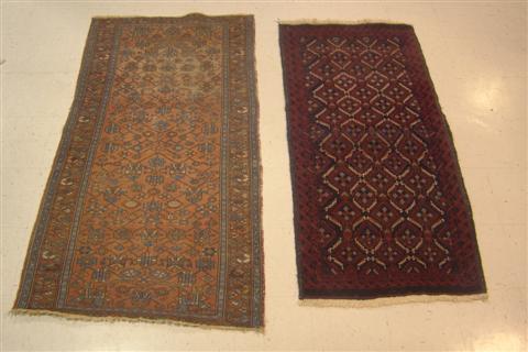 A BALOUCH AND A TRIBAL RUG the