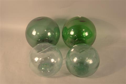 FOUR GLASS GAZING BALLS two small and