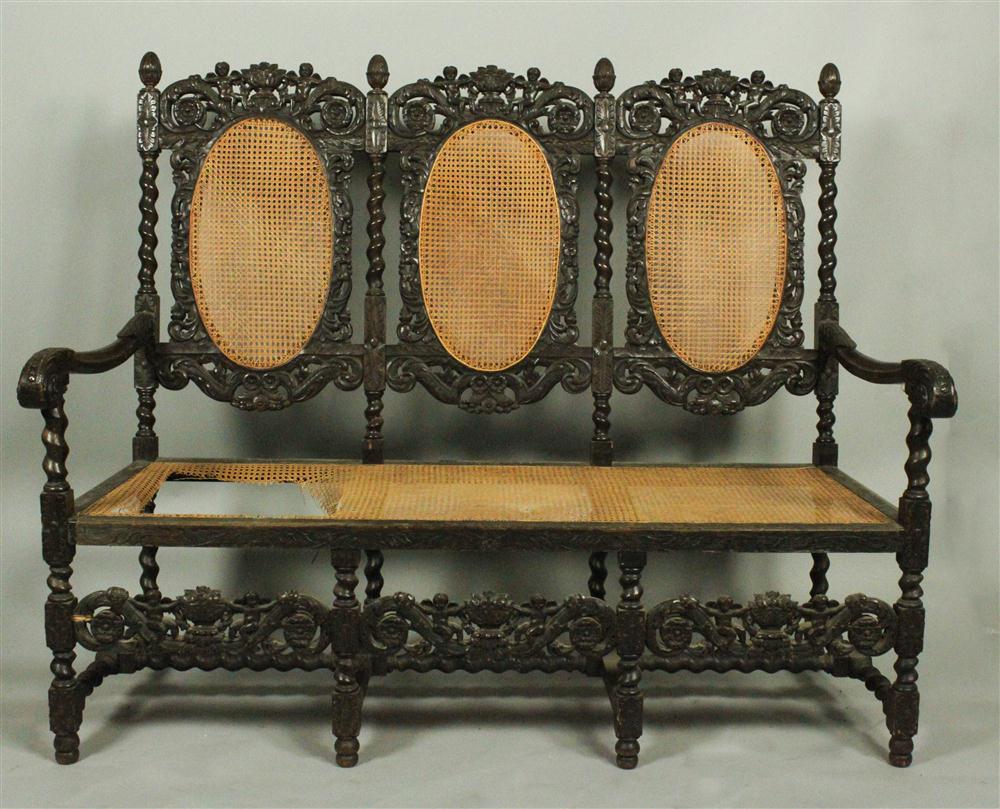 BAROQUE CARVED AND CANED SETTEE