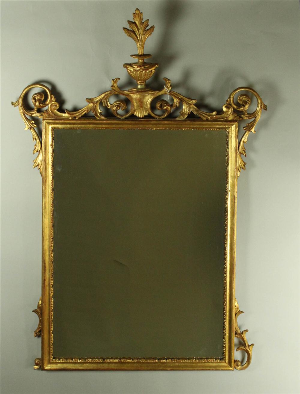 RECTANGULAR MIRROR SURROUNDED BY SCROLLWORK