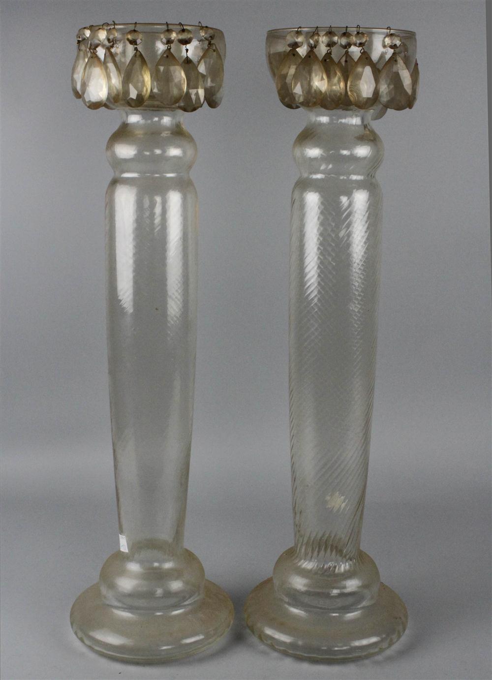 TWO MASSIVE GLASS CANDLEHOLDERS with