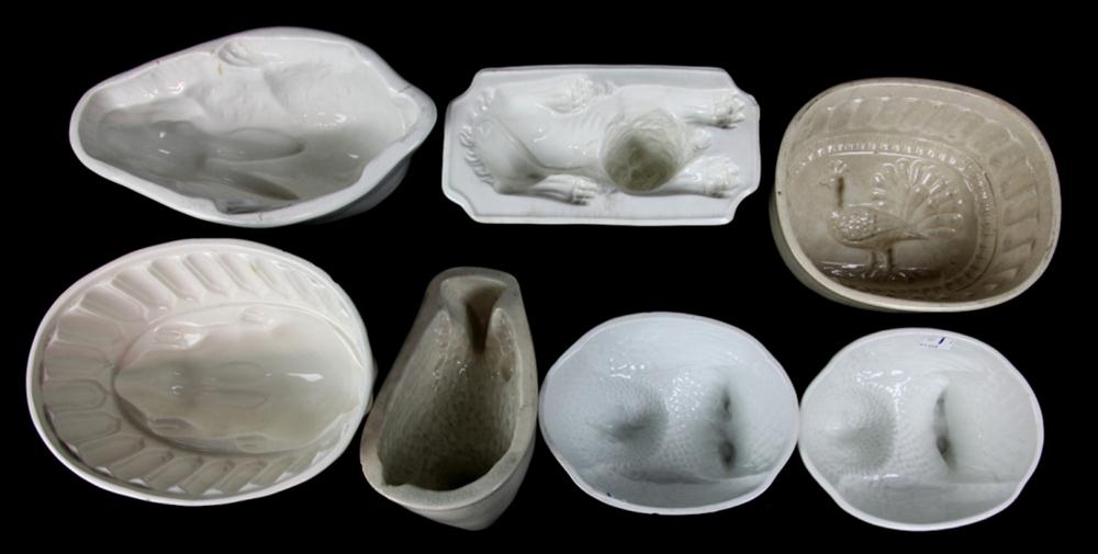 SEVEN CERAMIC MOLDS OF BIRDS AND 148226
