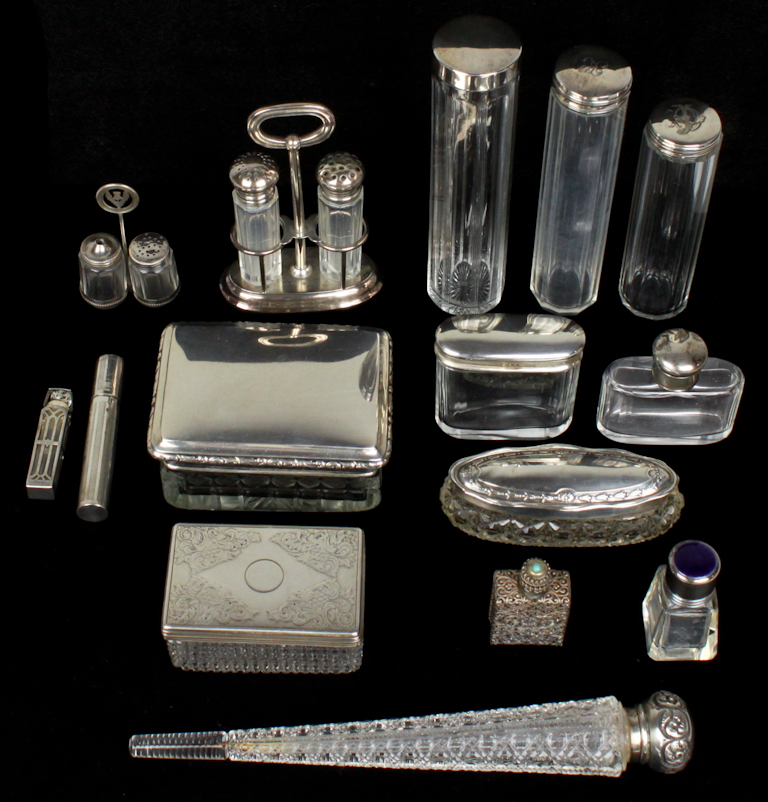 TWELVE SILVER MOUNTED GLASS ARTICLES 148245
