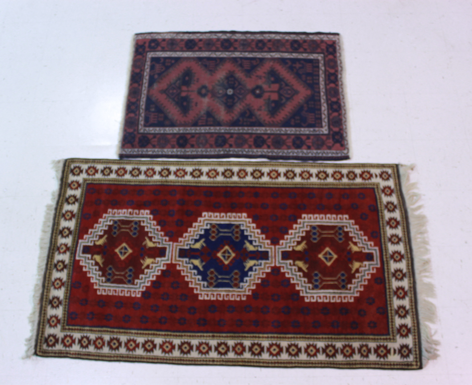 TWO CAUCASUS RUGS the larger in 148290