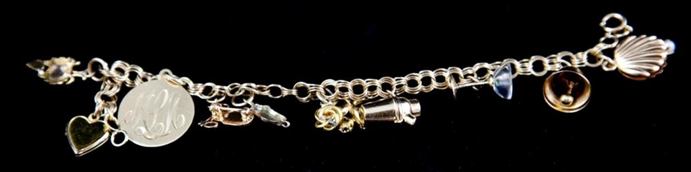 LADY'S YELLOW GOLD CHARM BRACELET