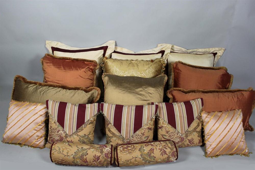 SIXTEEN DECORATIVE DESIGNER CUSHIONS