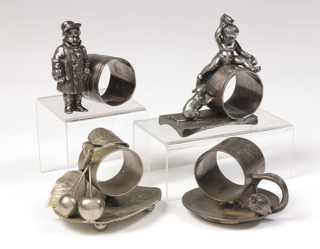 4 FIGURAL SILVERPLATE NAPKIN RINGS  1484b7