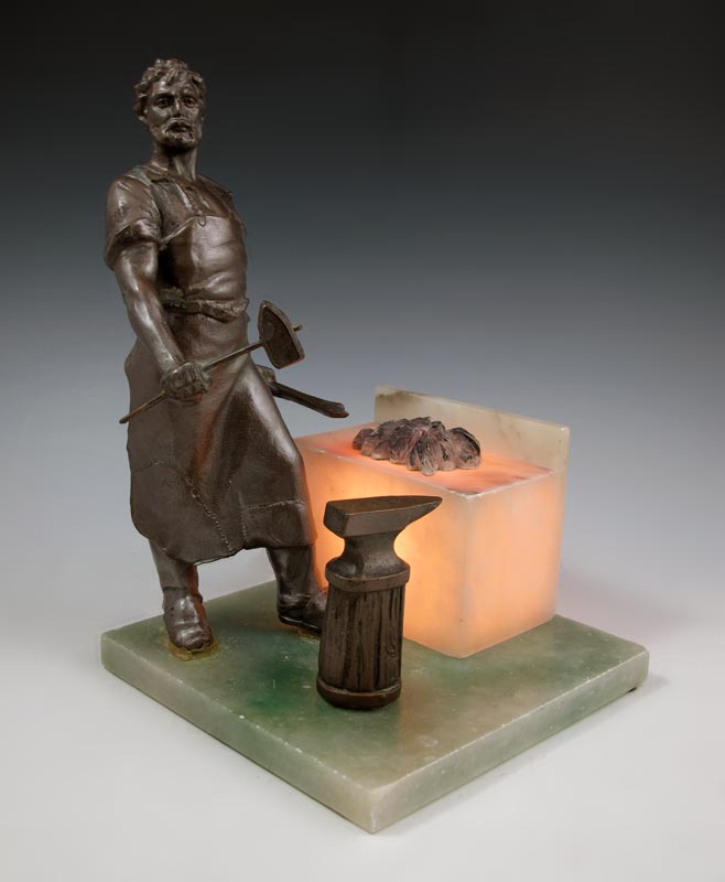 BLACKSMITH FIGURAL LAMP: Bronzed
