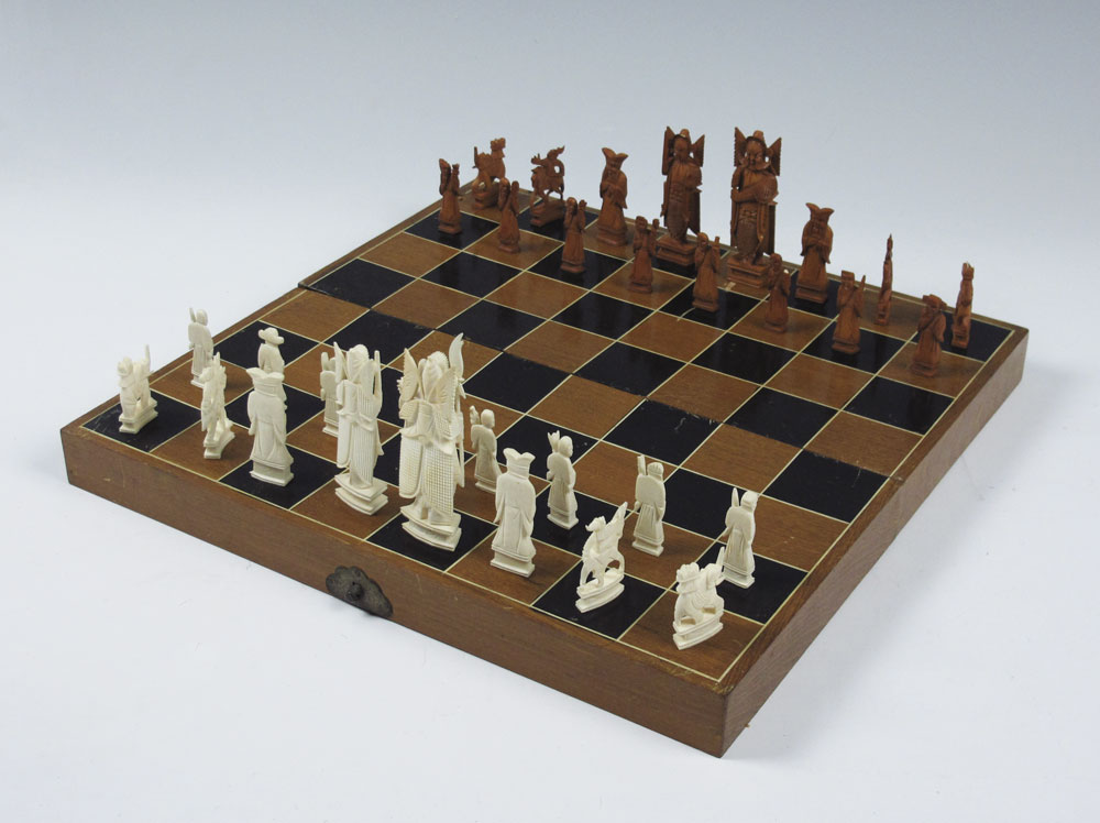 CHINESE CARVED IVORY CHESS SET: