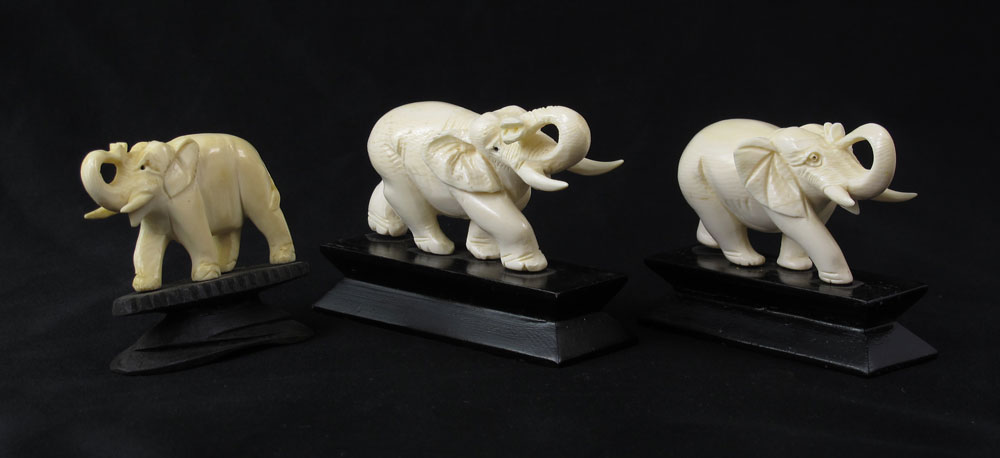 3 PIECE CARVED IVORY ELEPHANTS ON STANDS: