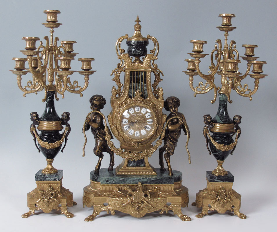 GILT METAL FIGURAL CLOCK GARNITURE 148d52