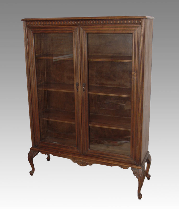 TWO DOOR BOOKCASE ON CARVED FEET  148e0d