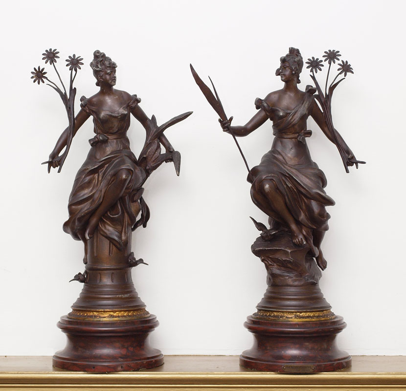 PAIR OF PATINATED SPELTER SCULPTURES