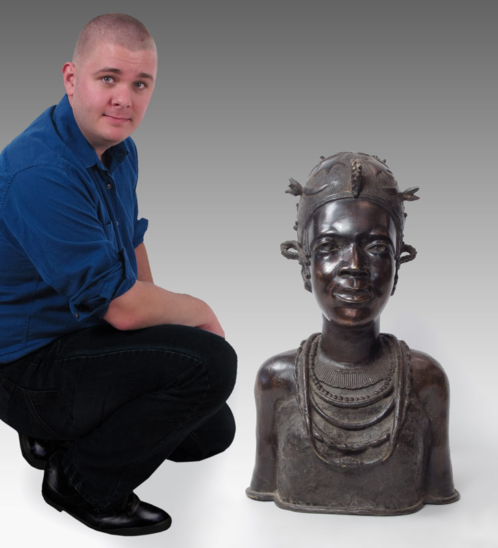 UNUSUAL AFRICAN CAST METAL HEAD